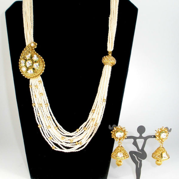long pearl haram with statement kundan side pendant