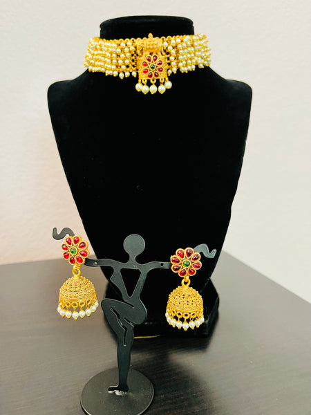 Pearl choker with elephant pendant and kemp stones