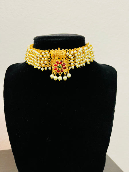 Pearl choker with elephant pendant and kemp stones